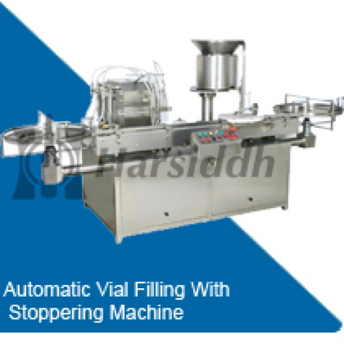 Vial filling stoppering machine